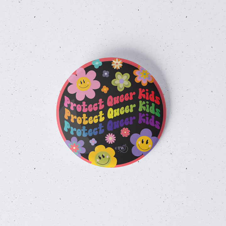 Based in Chicago by queer artist & designer Kayla Pekkala - Tiny Werewolves | Retro Flower Protect Queer Kids 1" Mini Button Pin in | Shop to get your Metal Pinback Button with collections featuring retro-inspired designs infused with social commentary art, highlighting modern social & current events.
