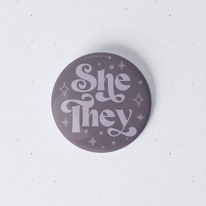 Based in Chicago by queer artist & designer Kayla Pekkala - Tiny Werewolves | She / They Pronouns Retro Stars 1" Mini Button Pin in | Shop to get your Metal Pinback Button with collections featuring retro-inspired designs infused with social commentary art, highlighting modern social & current events.