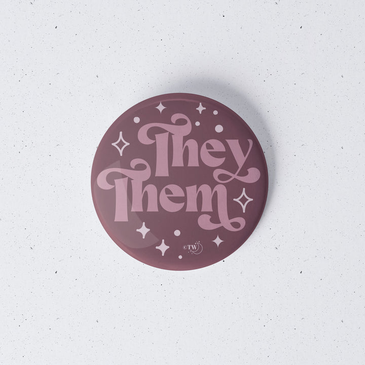 Based in Chicago by queer artist & designer Kayla Pekkala - Tiny Werewolves | They / Them Pronouns Retro Stars 1" Mini Button Pin in | Shop to get your Metal Pinback Button with collections featuring retro-inspired designs infused with social commentary art, highlighting modern social & current events.