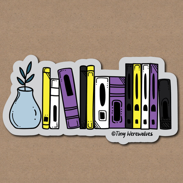 Based in Chicago by queer artist & designer Kayla Pekkala - Tiny Werewolves | Non-Binary Bookshelf Pride Sticker in 5" Sticker | Shop to get your Sticker with collections featuring retro-inspired designs infused with social commentary art, highlighting modern social & current events.