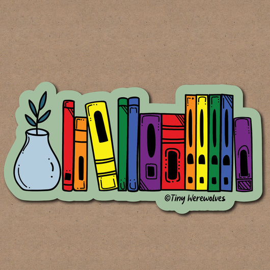 Based in Chicago by queer artist & designer Kayla Pekkala - Tiny Werewolves | Rainbow Bookshelf Pride Sticker in 5" Sticker | Shop to get your Sticker with collections featuring retro-inspired designs infused with social commentary art, highlighting modern social & current events.
