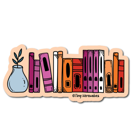 Based in Chicago by queer artist & designer Kayla Pekkala - Tiny Werewolves | Lesbian Bookshelf Pride Sticker in | Shop to get your Sticker with collections featuring retro-inspired designs infused with social commentary art, highlighting modern social & current events.