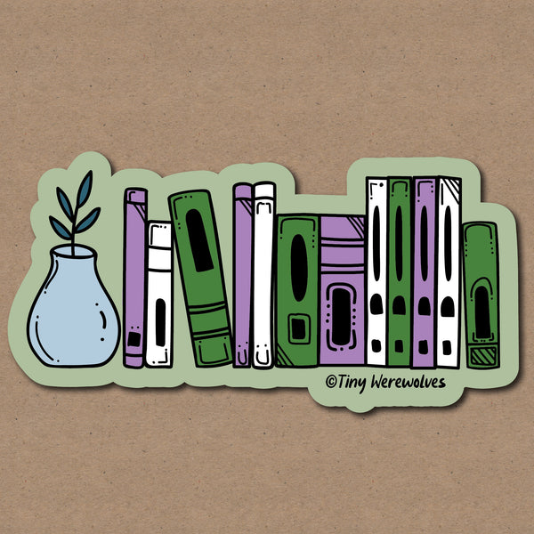 Based in Chicago by queer artist & designer Kayla Pekkala - Tiny Werewolves | Gender Queer Bookshelf Pride Sticker in 5" Sticker | Shop to get your Sticker with collections featuring retro-inspired designs infused with social commentary art, highlighting modern social & current events.