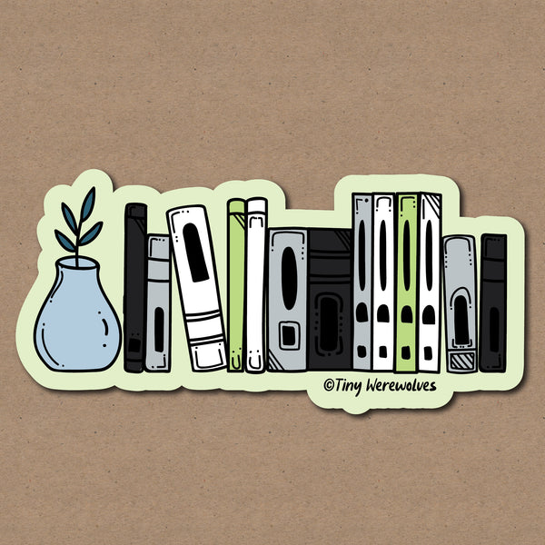 Based in Chicago by queer artist & designer Kayla Pekkala - Tiny Werewolves | Agender Bookshelf Pride Sticker in 5" Sticker | Shop to get your Sticker with collections featuring retro-inspired designs infused with social commentary art, highlighting modern social & current events.